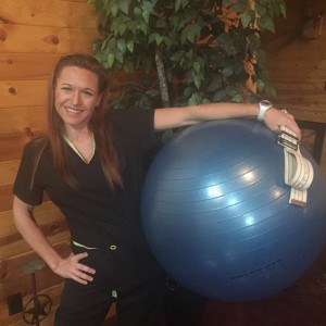 Picture of me, Shawna, holding a swissball and gait belt